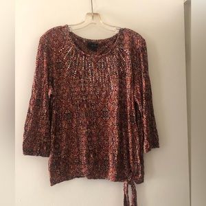 Erika Rust and brown print blouse with gold studs. Size XL
